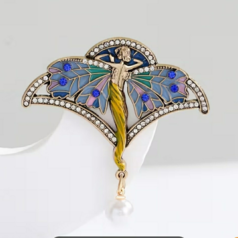 Elegant Butterfly Woman Brooch with Blue and Gold Accents